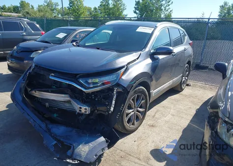 2021 Honda Cr-V Awd Touring z USA, uszkodzony, nr VIN 5J6RW2H9XML014474